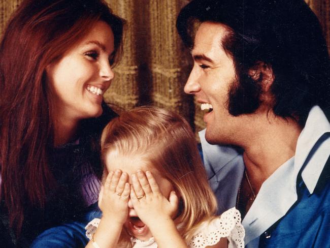 Elvis Presley with Priscilla and daughter Lisa Marie.