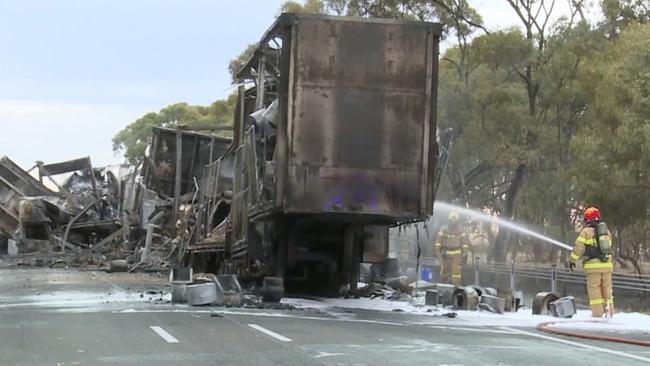 Emergency services on the scene, extinguishing the blaze. Picture: Nine News