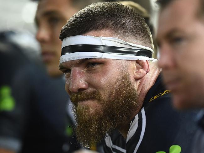 TOWNSVILLE, AUSTRALIA - JUNE 08: Josh McGuire of the Cowboys looks on from the bench during the round 13 NRL match between the North Queensland Cowboys and the Manly Sea Eagles at 1300SMILES Stadium on June 08, 2019 in Townsville, Australia. (Photo by Ian Hitchcock/Getty Images)