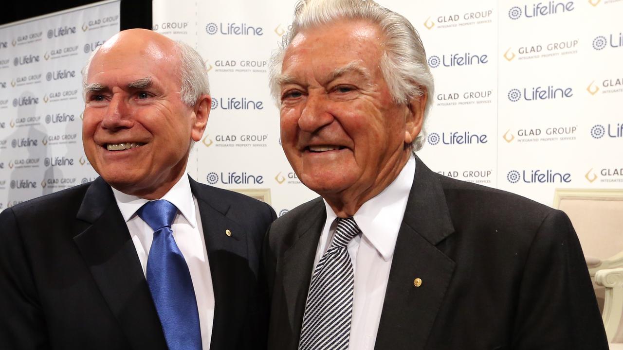 Former prime ministers John Howard and Bob Hawke at a Lifeline luncheon hosted by Ray Martin.