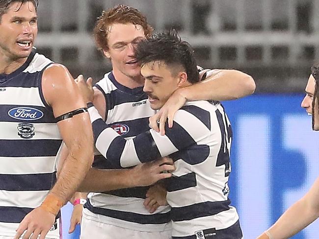 PERTH, AUSTRALIA - JULY 27: Bradley Close of the Cats celebrates his first goal during the round 8 AFL match between the Fremantle Dockers and the Geelong Cats at Optus Stadium on July 27, 2020 in Perth, Australia. (Photo by Paul Kane/Getty Images)