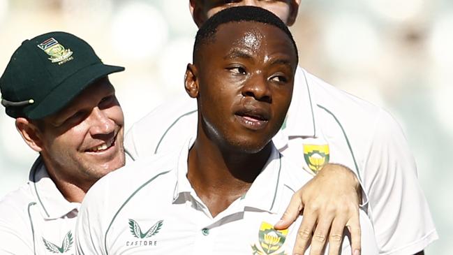 MELBOURNE, AUSTRALIA - DECEMBER 26: Kagiso Rabada of South Africa celebrates dismissing Usman Khawaja of Australia during day one of the Second Test match in the series between Australia and South Africa at Melbourne Cricket Ground on December 26, 2022 in Melbourne, Australia. (Photo by Darrian Traynor/Getty Images)