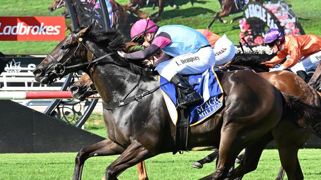 Luke Dempsey storms home aboard Give Me Space to win the Group 3 Vo Rogue Plate at Eagle Farm. Picture: Grant Peters - Trackside Photography.