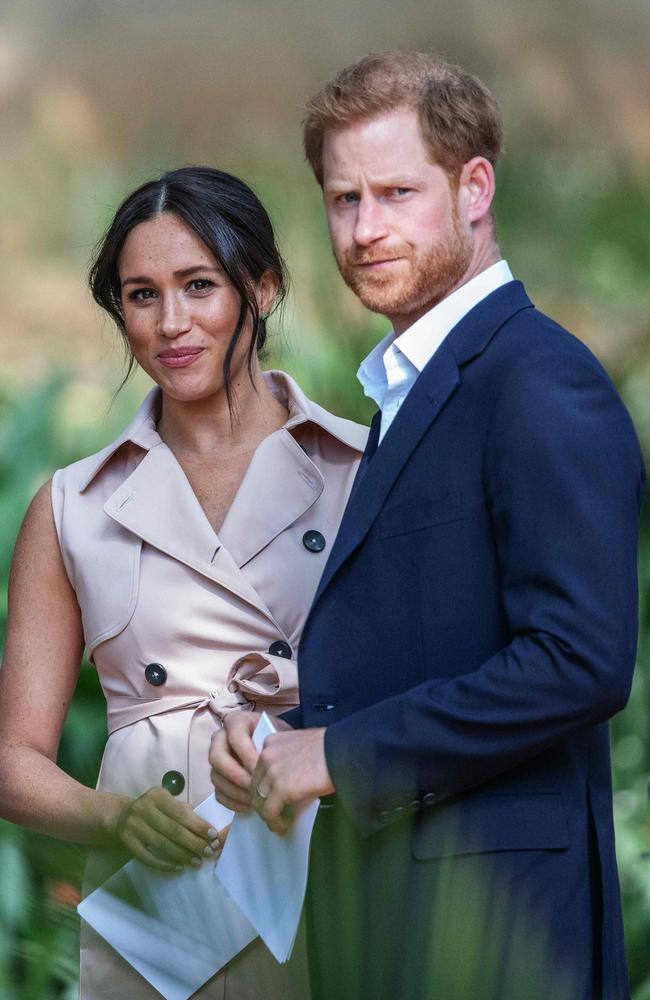 Meghan Markle and Prince Harry at the British High Commissioner residency in Johannesburg. Picture: Michele Spatari / AFP