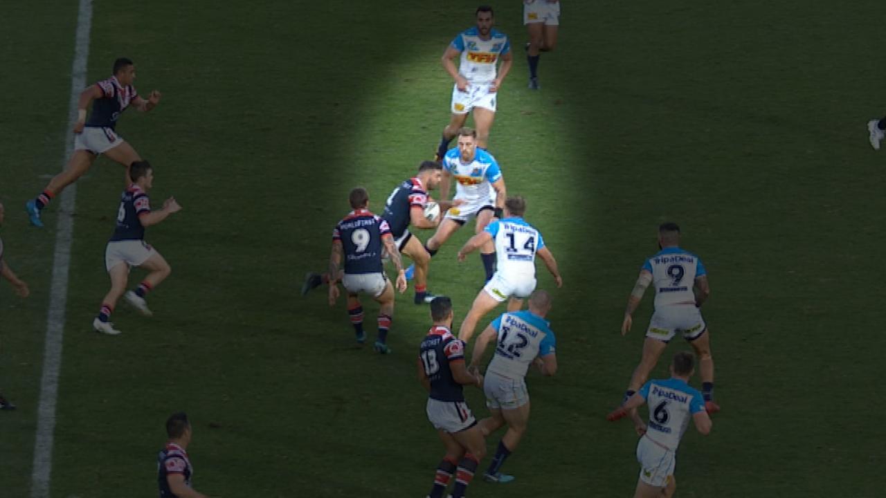 Bryce Cartwright fails to make a tackle attempt on James Tedesco who runs past him.