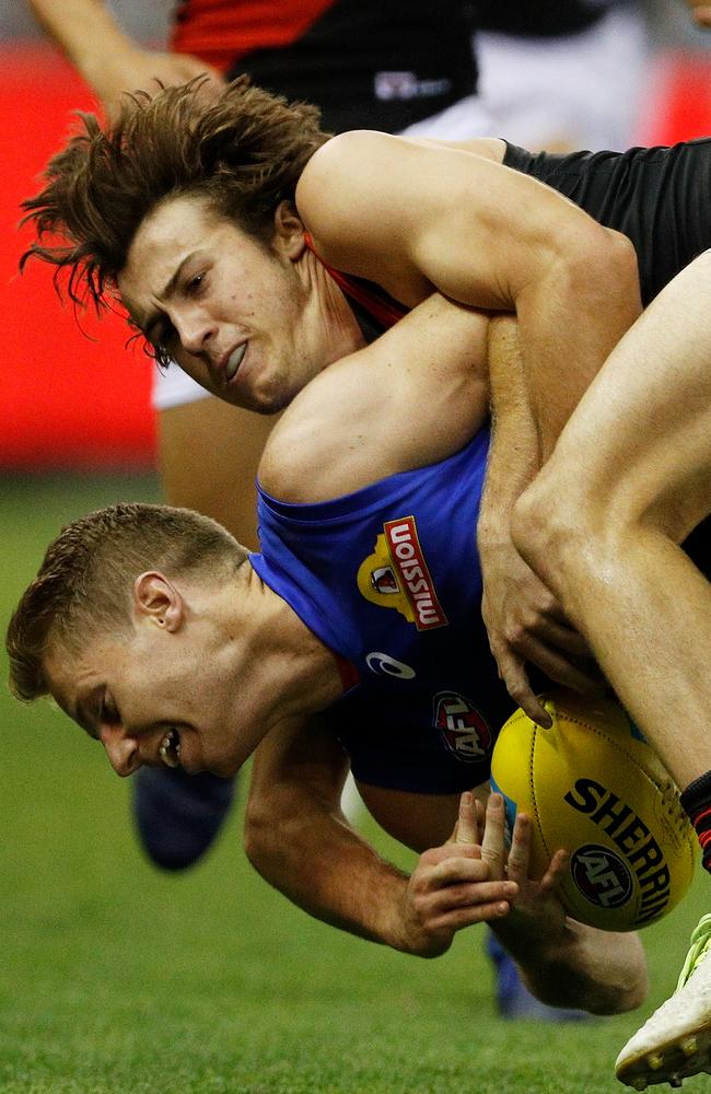 The holding the ball rule has always been a contentious one in footy.