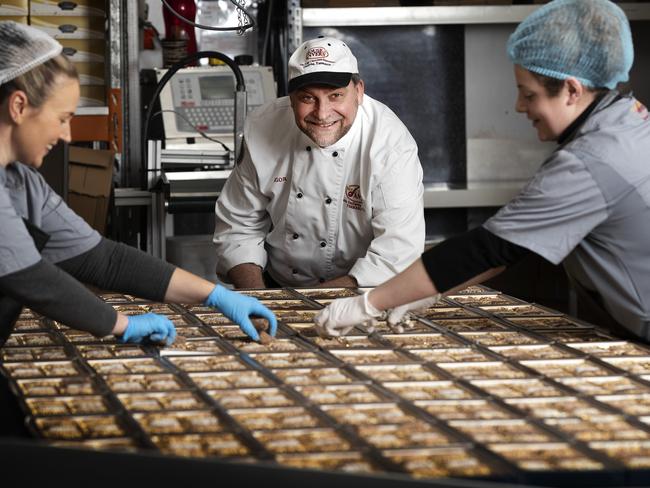 Chocolate maker Igor Van Gerwen with employees puttng together another batch of goodness. Picture: CHRIS KIDD