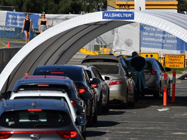 Cars queue up for a free drive-through COVID-19 testing. Picture: AFP