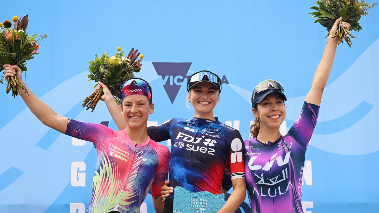 Runner-up Chloe Dygert, race winner Ally Wollaston and third-place Georgia Baker on the podium of the first-ever Women’s Surf Coast Classic. Picture: Dario Belingheri/Getty Images)