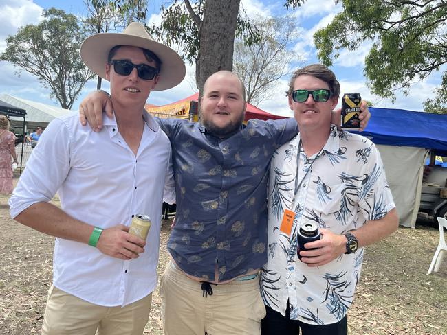 The boys having a ball at the Torbanlea Picnic Races.