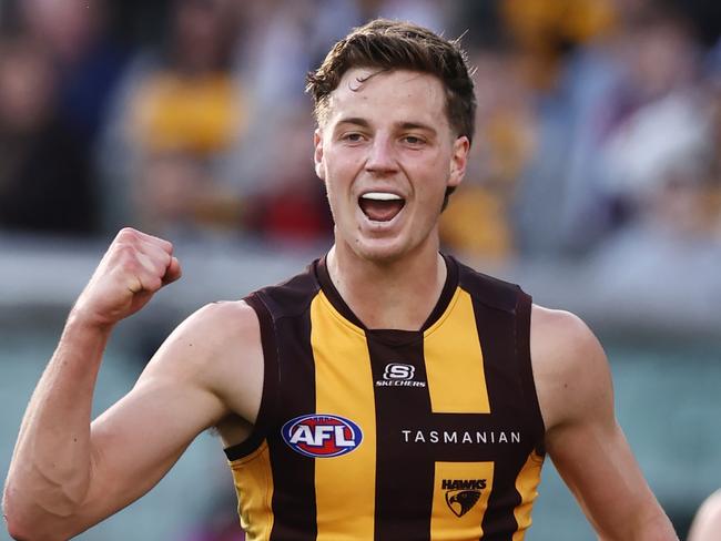 MELBOURNE, AUSTRALIA - August 20, 2023. AFL .  Henry Hustwaite of the Hawks  celebrates a 1st quarter goal during the round 23 match between Melbourne and Hawthorn the MCG in Melbourne, Australia.  Photo by Michael Klein.