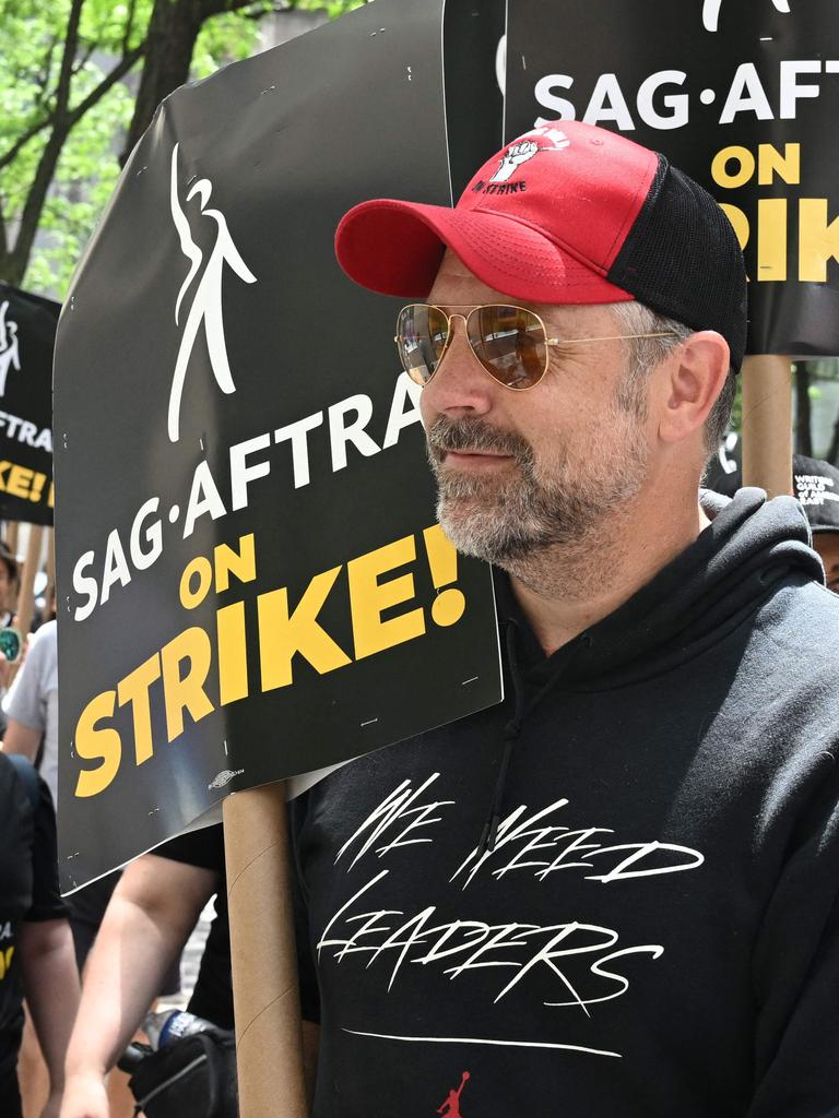 Jason Sudeikis joined members of the Writers Guild of America and the Screen Actors Guild as they walk a picket line outside NBC Universal in New York City. Picture: Timothy A. Clary/AFP