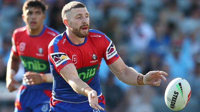 Jackson Hastings of the Knights passes during the NRL trial match between Newcastle Knights and Cronulla Sharks at Industree Group Stadium. Picture: Jason McCawley/Getty Images