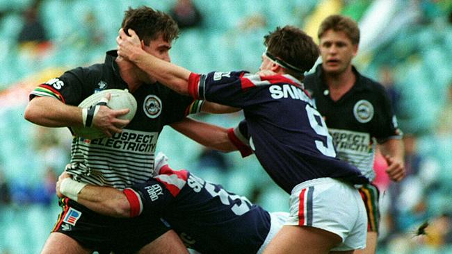 Penrith’s Brad Fittler taking on the Roosters in 2004.