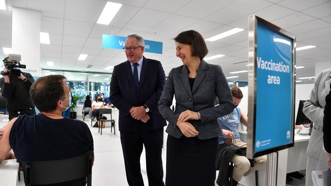 NSW Premier Gladys Berejiklian (centre) and NSW Health Minister Brad Hazzard during a tour of the NSW Vaccination Centre. Photo: Sam Mooy/Pool