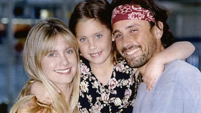 Lattanzi with parents Olivia Newton-John and Matt Lattanzi in Sydney in 1993. (Picture: Supplied)