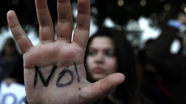 An anti “bail-in” protester in Cyprus. Picture: Petros Karadjias/AP