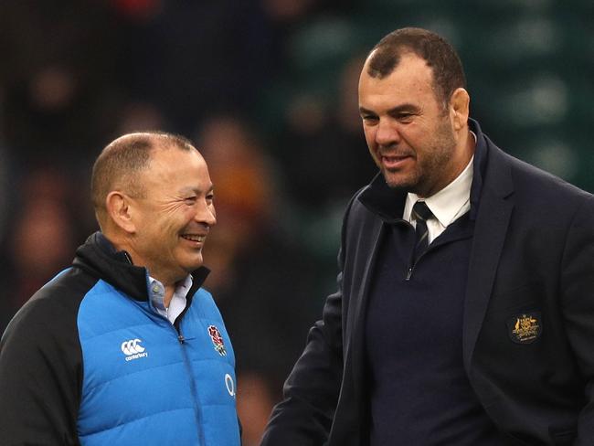 England's coach Eddie Jones (L) talks to Australia's coach Michael Cheika before the international rugby union test match between England and Australia at Twickenham stadium in south-west London on November 24, 2018. (Photo by Adrian DENNIS / AFP)