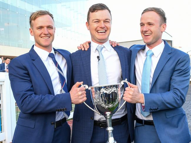 MELBOURNE, AUSTRALIA - SEPTEMBER 02: Trainers Will Hayes, Ben Hayes and JD Hayes pose with trophy after Mr Brightside won in Race 9, the Stow Storage Memsie Stakes, during Melbourne Racing at Caulfield Racecourse on September 02, 2023 in Melbourne, Australia. (Photo by Vince Caligiuri/Getty Images)