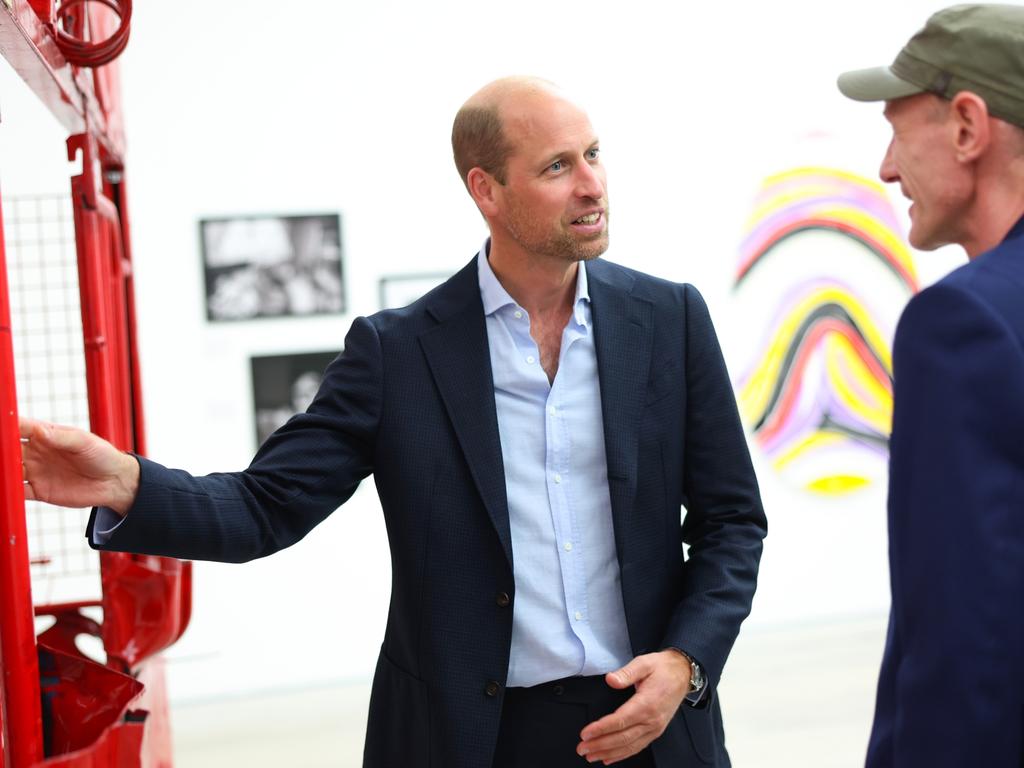 Prince William speaks to one of the artist during the Homelessness: Reframed exhibition in London. Picture: Getty Images