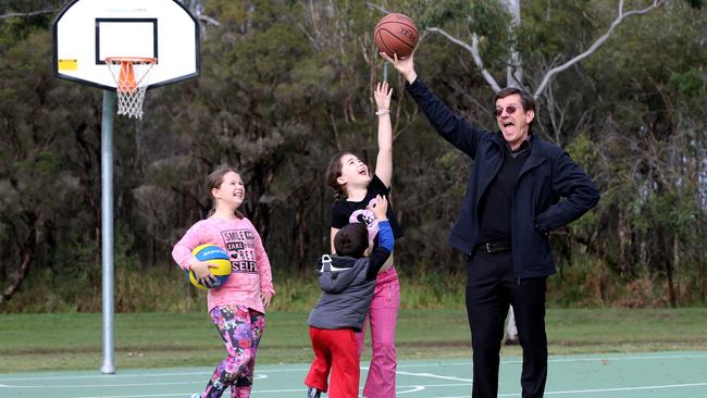 Councillor Peter Cumming launches the basketball court in Manly in 2016. Picture: Renae Droop