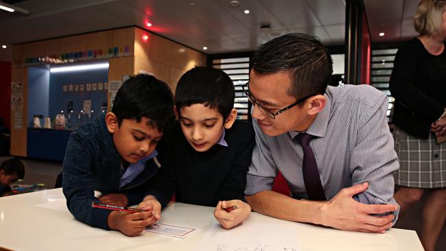 Maths teacher Eddie Woo with Kindergarten students at Parramatta Public School. Picture: Adam Yip