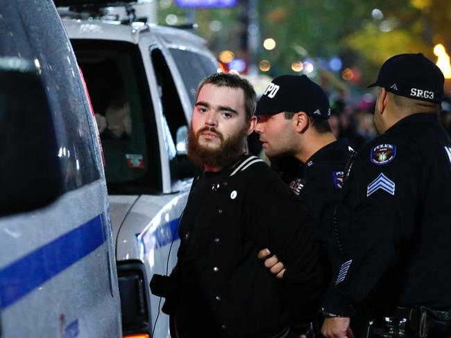 Police arrest a protester rallying against President-elect Donald Trump in New York City. Picture: Kena Betancur/AFP