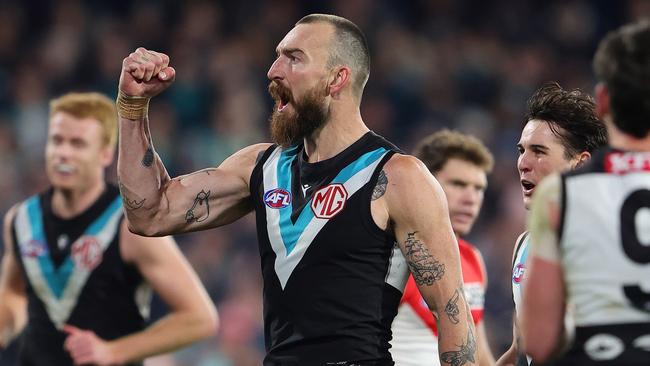 Dixon celebrates a goal for the Power last season. Picture: Sarah Reed/AFL Photos via Getty Images