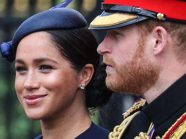 NON-EXCLUSIVE PICTURE: MATRIXPICTURES.CO.UK PLEASE CREDIT ALL USES  WORLD RIGHTS  Prince Harry, Duke of Sussex and Meghan, Duchess of Sussex ride by carriage down the Mall during the Trooping The Colour, the Queen's annual birthday parade in London.  The Queen will then take her salute at a fly-past of the Royal Air Force from the balcony at Buckingham Palace.  The ceremony of Trooping the Colour is believed to have first been performed during the reign of King Charles II.   Since 1748, the Trooping of the Colour has marked the official birthday of the British Sovereign.   Over 1400 parading soldiers, almost 300 horses and 400 musicians take part in the event.   JUNE 8th 2019  REF: JRD 192105