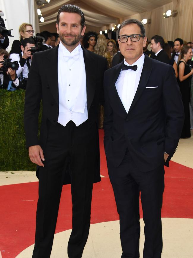 Russell at right with his Silver Linings Playbook star Bradley Cooper. Picture: Getty Images/AFP