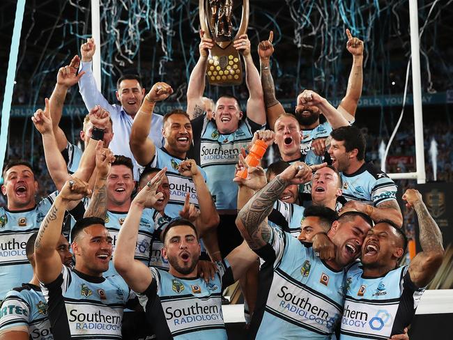 The Cronulla Sharks celebrate winning the 2016 NRL Grand Final after defeating the Melbourne Storm at ANZ Stadium. Picture. Phil Hillyard
