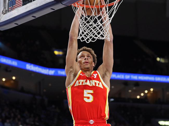 MEMPHIS, TENNESSEE - MARCH 03: Dyson Daniels #5 of the Atlanta Hawks goes to the basket during the game against the Memphis Grizzlies at FedExForum on March 03, 2025 in Memphis, Tennessee. NOTE TO USER: User expressly acknowledges and agrees that, by downloading and or using this photograph, User is consenting to the terms and conditions of the Getty Images License Agreement. (Photo by Justin Ford/Getty Images)