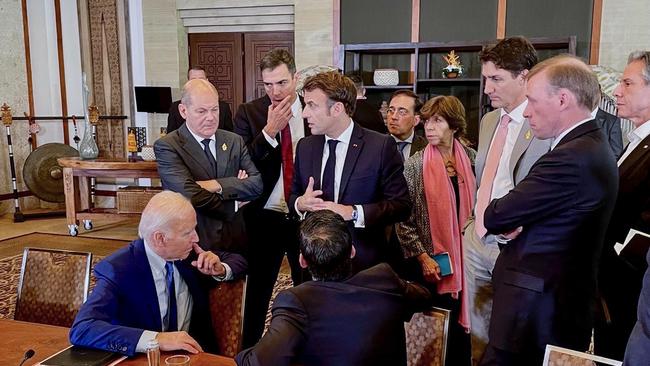 (L-R) US-President Joe Biden, German Chancellor Olaf Scholz, Spanish Prime Minister Pedro Sanchez, French President Emmanuel Macron, British Prime Minister Rishi Sunak, Spanish Foreign Minister Jose Manuel Albares Bueno, French Foreign Minister Catherine Colonna, Canadian Prime Minister Justin Trudeau and US Foreign Minister Antony Blinken talk about the missile strike in Poland. (Photo by Hebestreit/Bundesregierung via Getty Images)