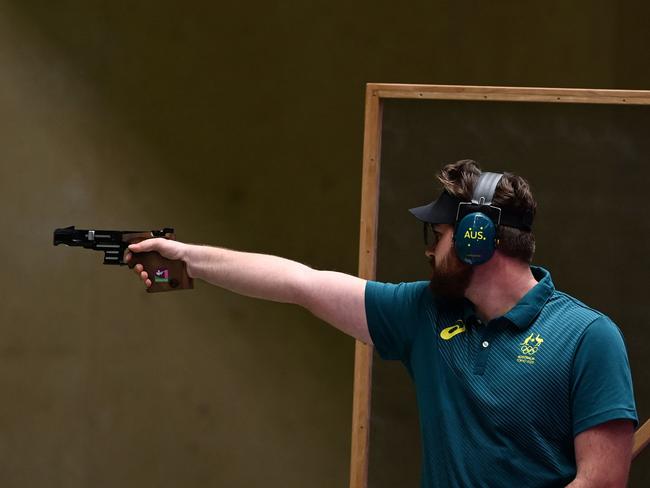 Australia's Sergei Evglevski in the 25m rapid fire pistol qualification. Picture: AFP