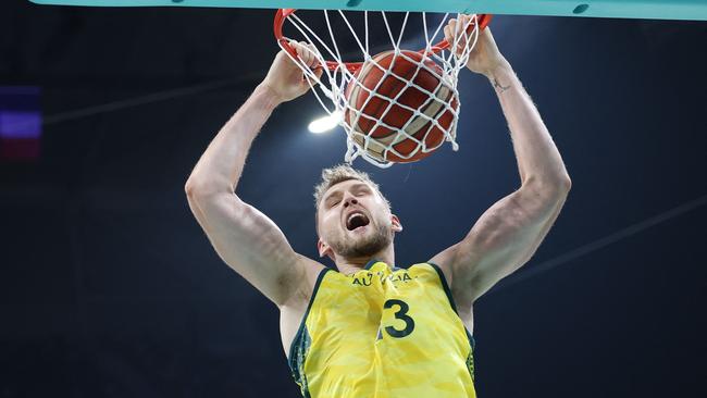 Jock Landale dunks the ball against Greece. Picture: AFP