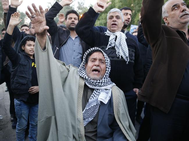 Iranians march in the streets to pay homage to slain top general Qasem Soleimani. Picture: AFP