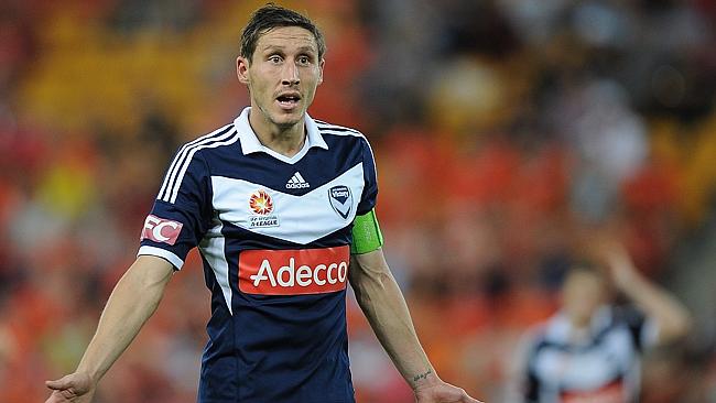 Mark Milligan of the Victory is bemused after not being awarded a penalty.