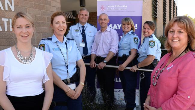 Inspector Jayne Doherty (back right) with fellow officers promoting a White Ribbon Day breajkfast. Picture: Ian Svegovic