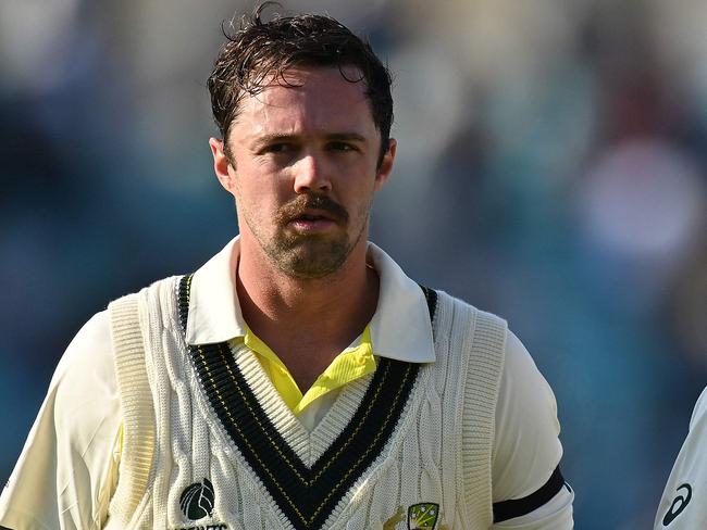 Australia's Travis Head and Australia's Steve Smith walk back to the pavilion after the end of play during day 1 of the ICC World Test Championship cricket final match between Australia and India at The Oval, in London, on June 7, 2023. (Photo by Glyn KIRK / AFP) / RESTRICTED TO EDITORIAL USE. NO ASSOCIATION WITH DIRECT COMPETITOR OF SPONSOR, PARTNER, OR SUPPLIER OF THE ECB