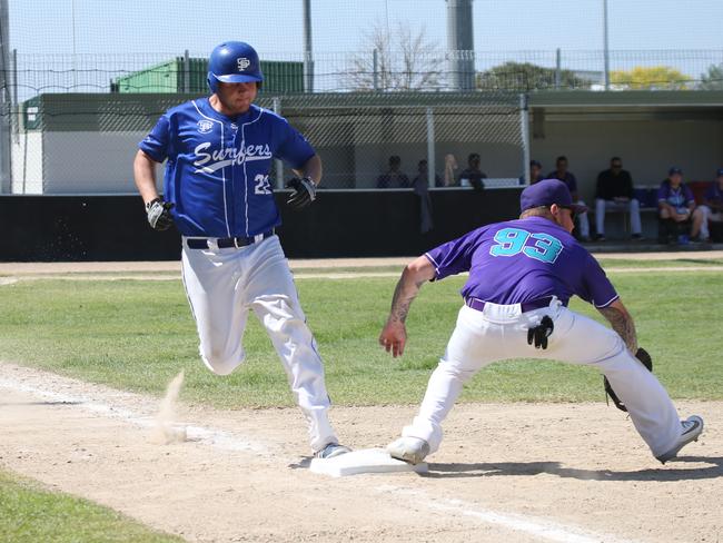 Greater Brisbane League baseball - Coomera vs Surfers Paradise at Beenleigh. Surfers’ Nathan Cunningham and Coomera’s Craig Weeks. Picture: Mike Batterham