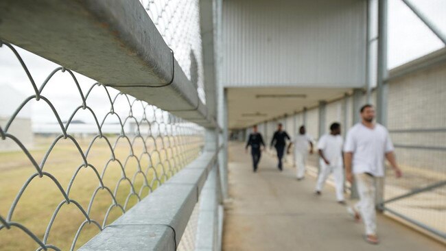 Staff escort prisoners through Lotus Glen Correctional Centre. A 25-year-old man was arrested after being detaind by the dog squad on Sunday, after allegedly trying to smuggle drugs and other items into the prison. Picture: Daniel Soekov for Human Rights Watch