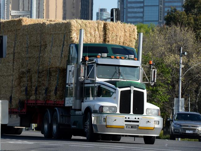 MELBOURNE, AUSTRALIA - NewsWire Photos OCTOBER 08, 2021: A heavy goods vehicle drives over Swan Street Bridge in inner Melbourne. Picture: NCA NewsWire / Andrew Henshaw