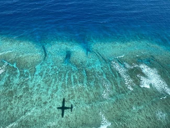 Aerial survey checks for coral bleaching. Picture: Great Barrier Reef Marine Park Authority