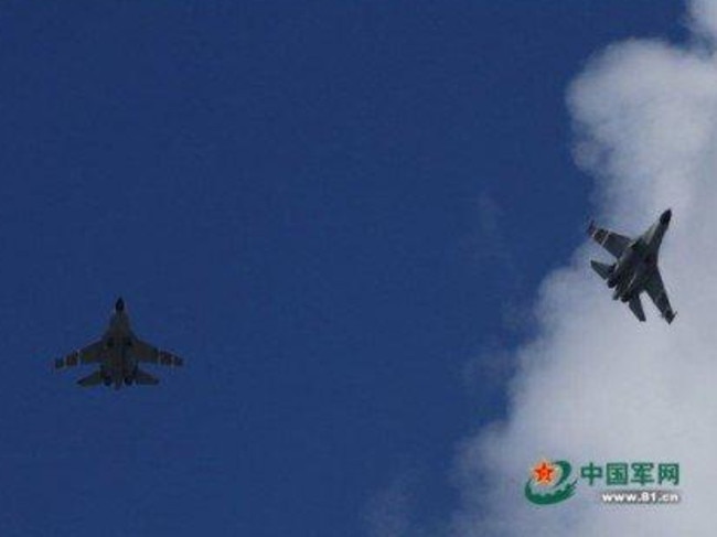 Reports China has sent armed fighter jets over South China Sea | news ...