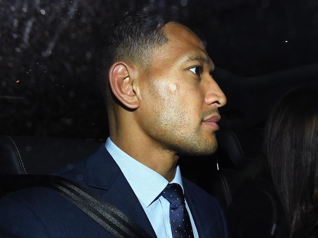 Wallabies star Israel Folau leaves a Code of Conduct hearing in Sydney, Tuesday, May 7, 2019. Folau appeared before a code of conduct hearing to fight Rugby Australia's decision to terminate his contract after he posted in mid-April on social media that gay people, along with other 'sinners' will face damnation unless they repent. (AAP Image/Joel Carrett) NO ARCHIVING