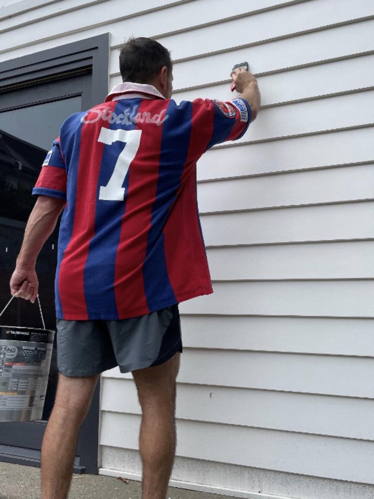 Matty Johns putting his brother's famous 1997 grand final jersey to good use.