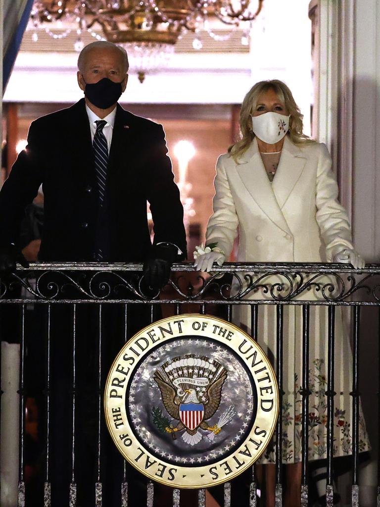 US President Joe Biden and first lady Jill Biden watch a fireworks show on the National Mall from the Truman Balcony at the White House. Picture: Chip Somodevilla/Getty Images