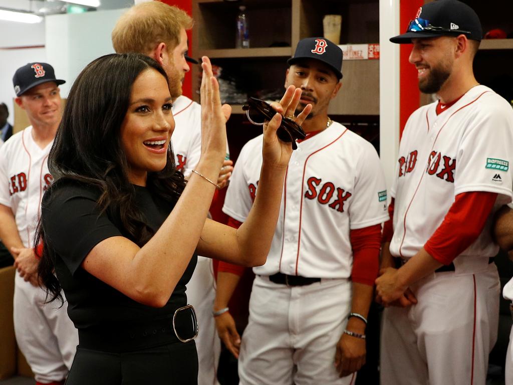 Meghan and Harry mix with the Red Sox before their game against the Yankees in London. Picture: Getty