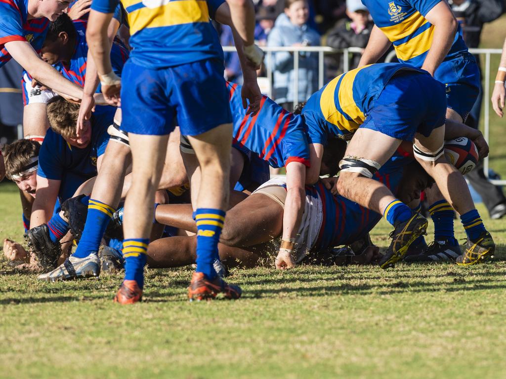 Trevor King goes over to try for Downlands against Grammar in O'Callaghan Cup on Grammar Downlands Day at Downlands College, Saturday, August 6, 2022. Picture: Kevin Farmer