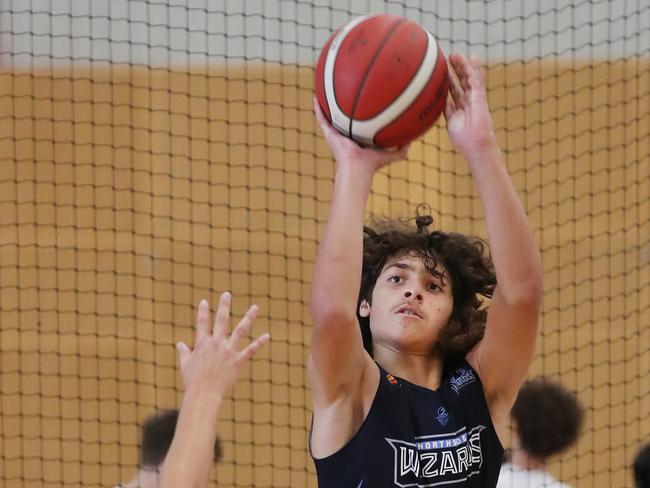 Basketball Queensland Under-16 Boys State Championships at the Coomera Indoor Sports Centre.Northside Wizards (Navy) v North Gold Coast Seahawks . Wizards Kaylan Jackson soars over Seahawks Cody Sidebottom   Picture Glenn Hampson